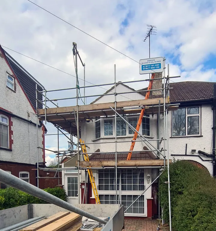 Residential scaffolding erected for roof renovation and chimney works on a house in Luton by Aron Scaffolding Services.